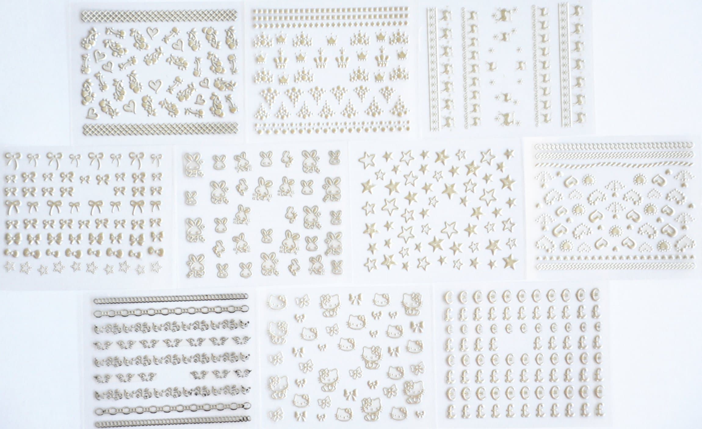 10pcs/package nail stickers decals multi mix designs including silver heart and flowers/silver crown/silver deer/silver butterfly bow/silver rabbits/silver stars/silver heart/silver jewelry/silver kitty/silver pound/etc.