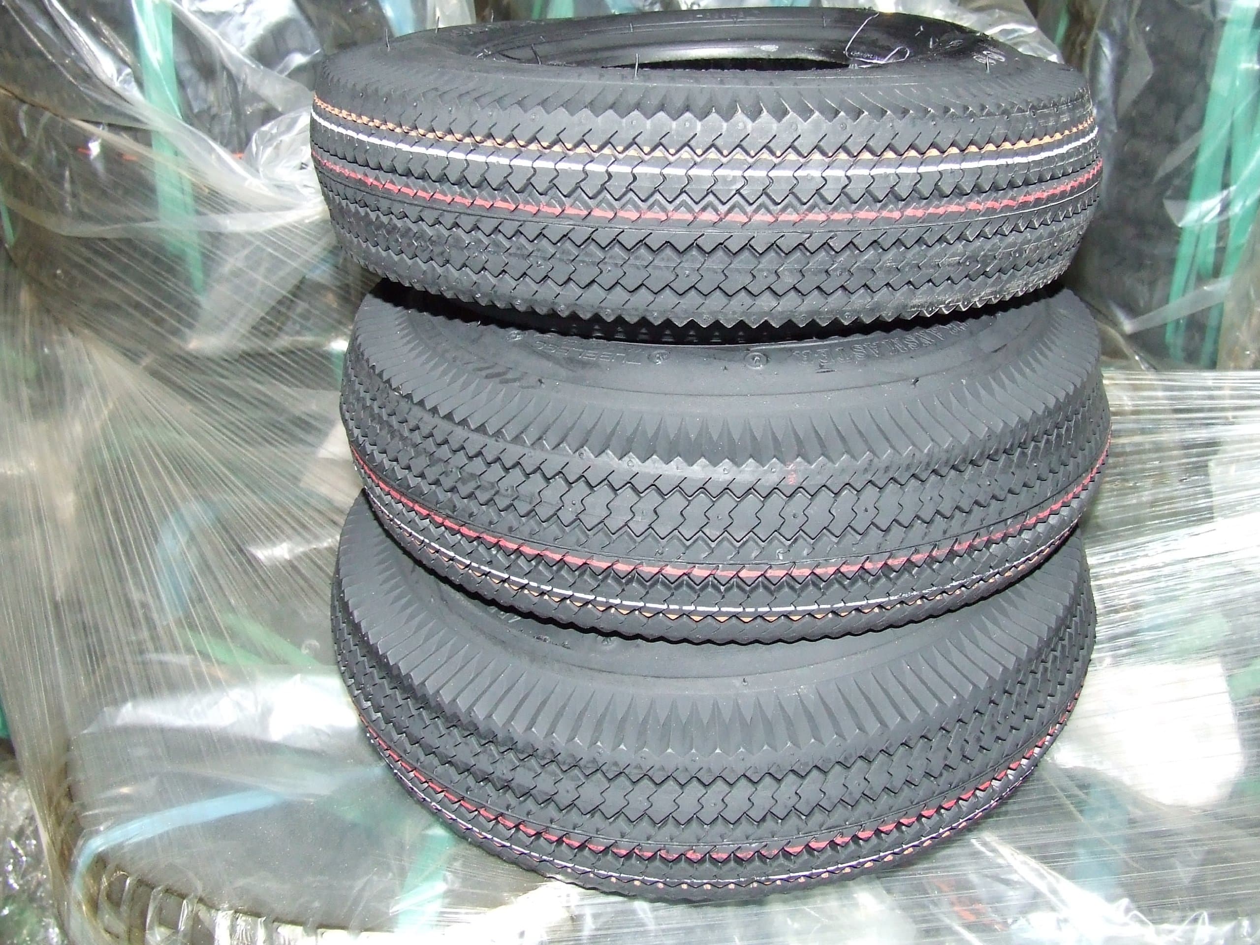 Two (2) Tires, Size: 4.10/3.50-5, 4 Plys. Sawtooth Tread